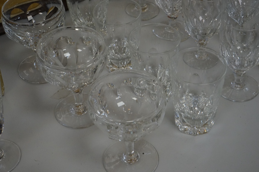 A suite of Thomas Webb Crystal wine glasses, Royal Yacht pattern, including two decanters, eight goblets, white wines and clarets, sixty-four pieces. Condition - mostly good